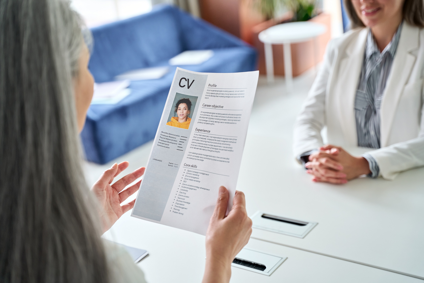 HR Manager Holding Cv Resume at Job Interview